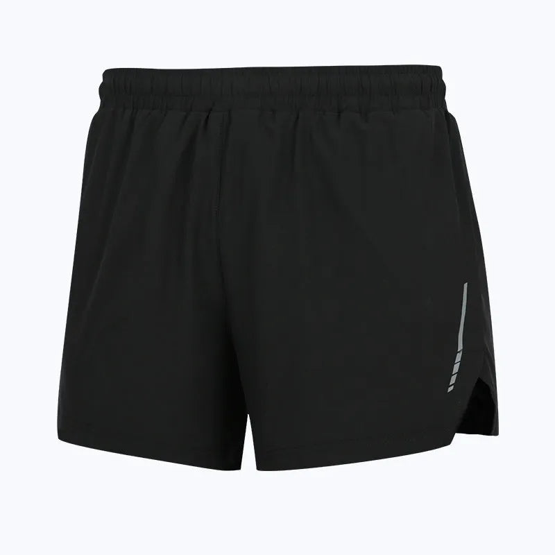 Man wearing gray quick-dry marathon running shorts, straight leg fit, for athletic training.