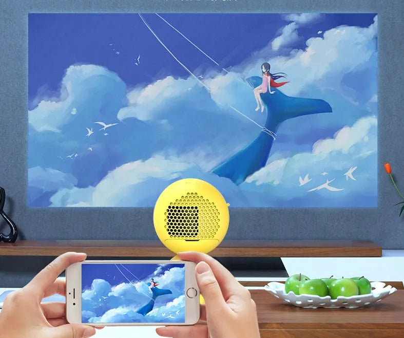 YG220 portable LED projector in yellow or white colour with international plug options