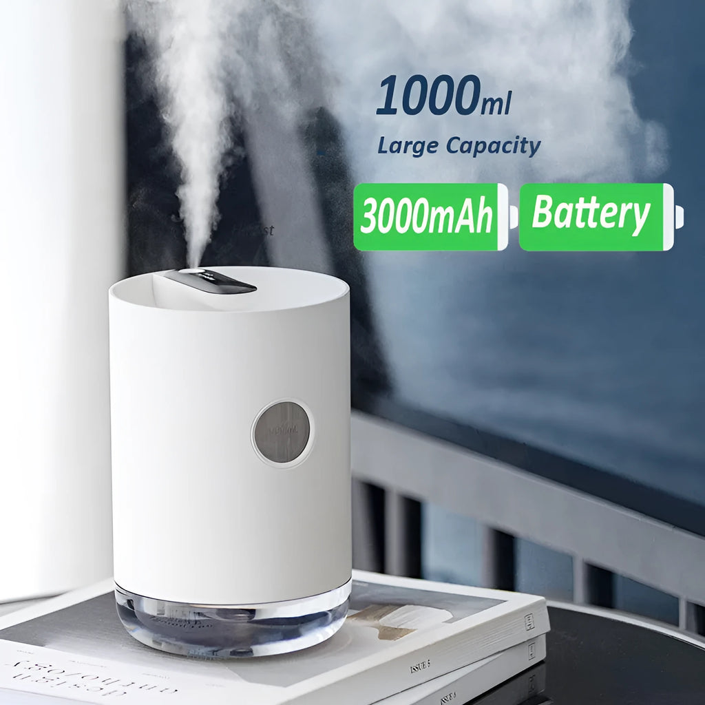 A blue wireless humidifier with a USB cable on a wooden desk.