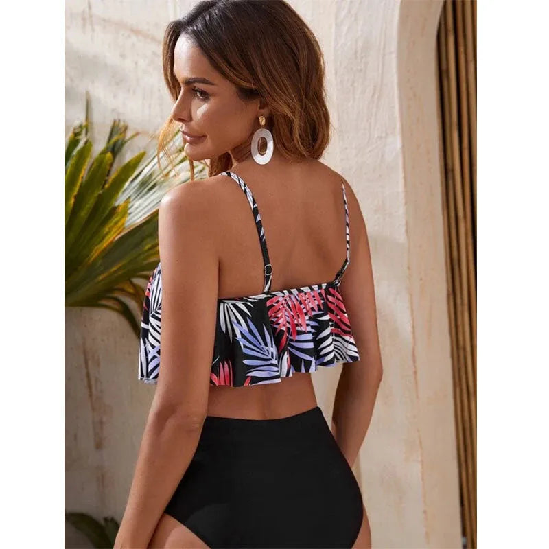 Women's white floral high-waist bikini with flounced detail on mannequin