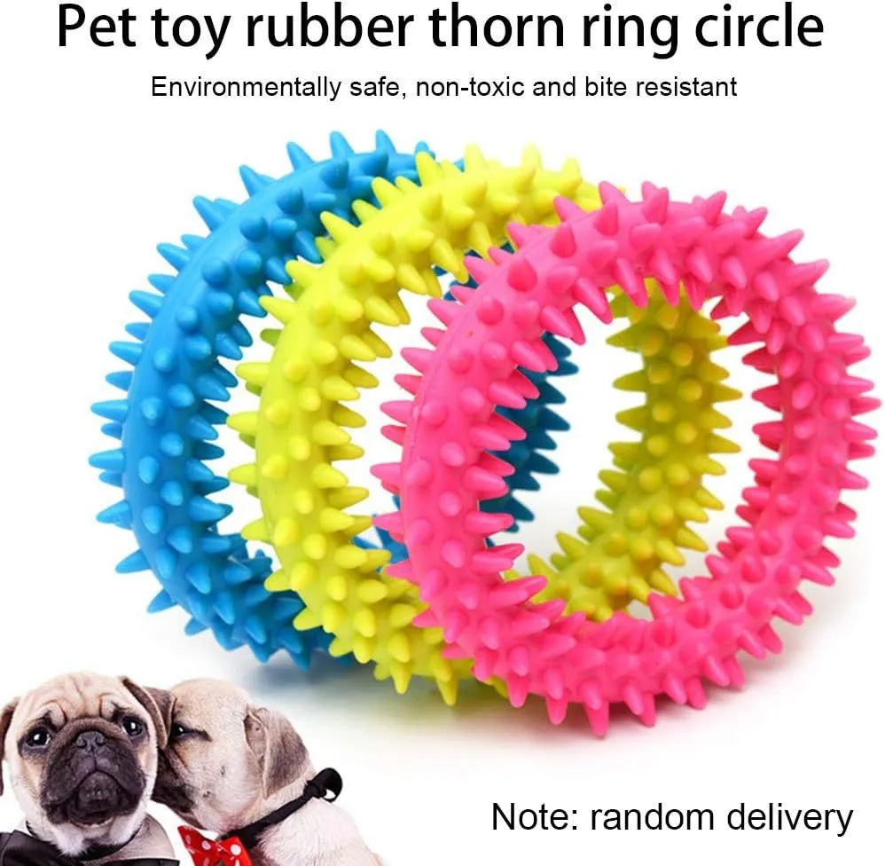 Blue TPR spiky circle ring dog chew toy on a white background.