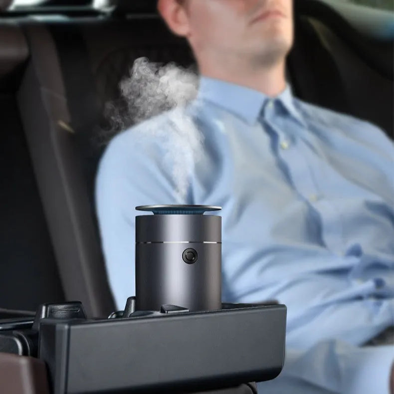 Dark gray column-shaped mini USB aromatherapy humidifier with 0.5-1L tank and single fog export.
