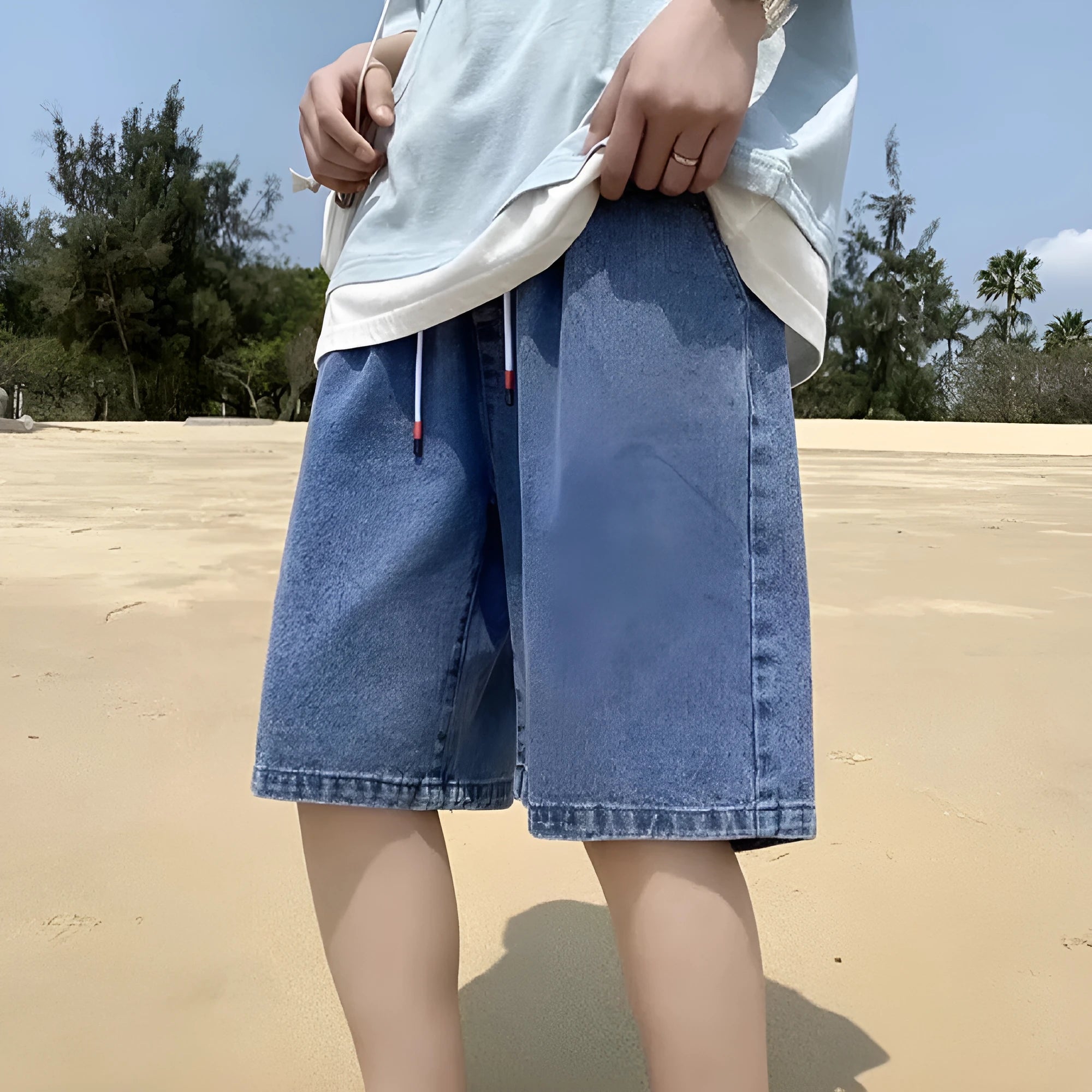 Men's loose straight casual cotton denim shorts in dark blue, front view