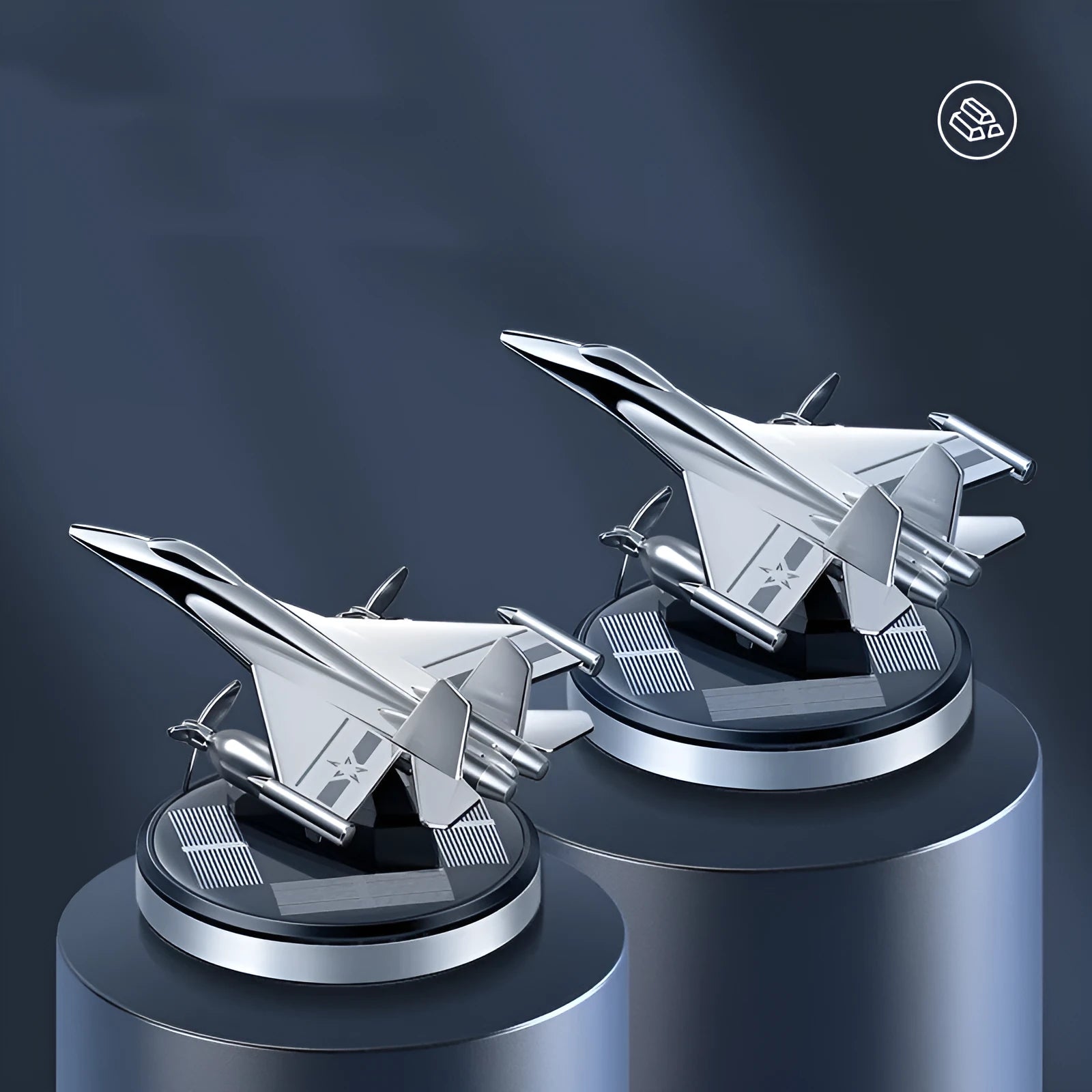 Silver solar-powered rotating fighter jet perfume ornament on a wooden surface.