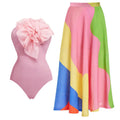 Women's deep V halter neck backless one-piece swimsuit with a floral print and removable skirt.