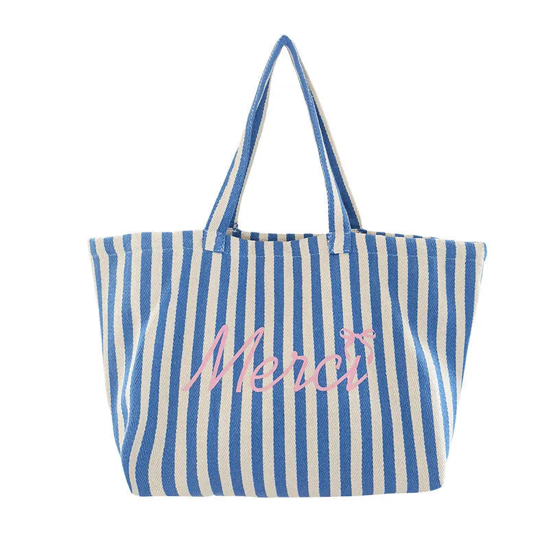 Blue and white striped cotton canvas bag with printed letters in a fresh, sweet style.