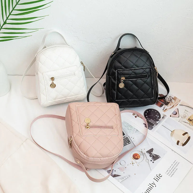 Girls' embroidered Korean style small hard backpack in black, shown with sandwich pocket.