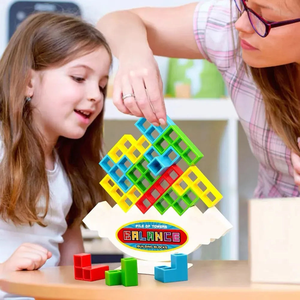 Plastic balance stacking board game with coloured building blocks on chassis for kids and adults