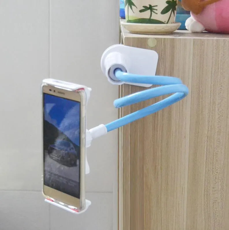 Bedside long-arm mobile phone holder in aluminium alloy and plastic on a table.