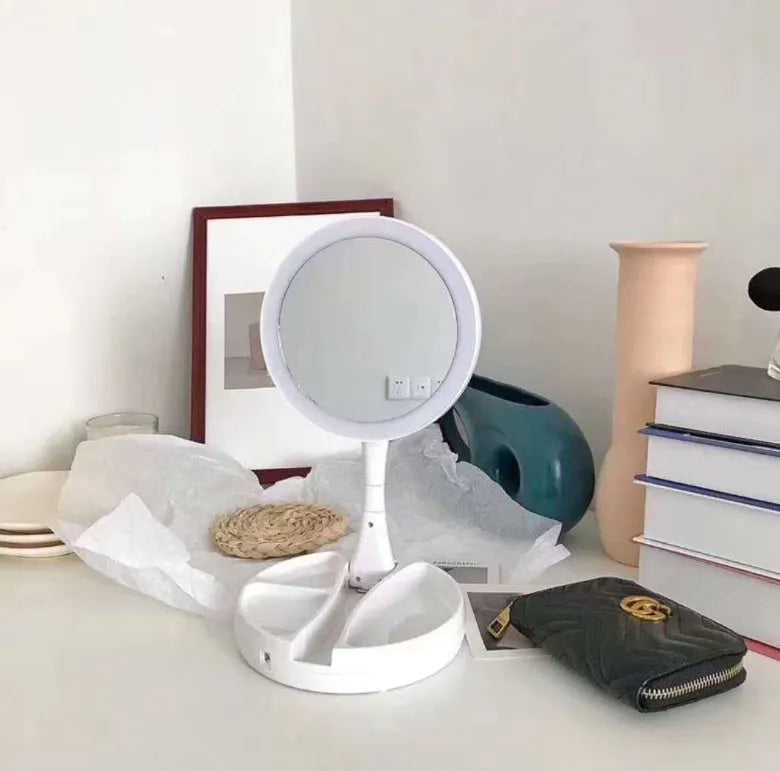 White acrylic LED vanity mirror with double-sided storage compartments and USB charging port