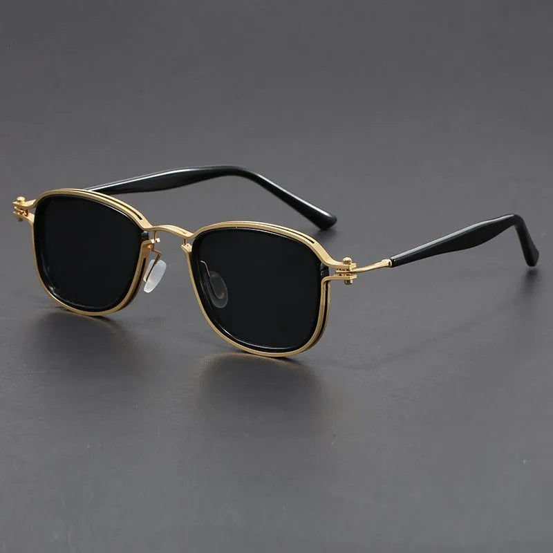 Retro style square frame sunglasses with metal and plastic construction in a black gold full gray colour.