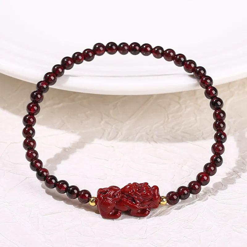 Square garnet bracelet with Pixiu carving in purple sand colour