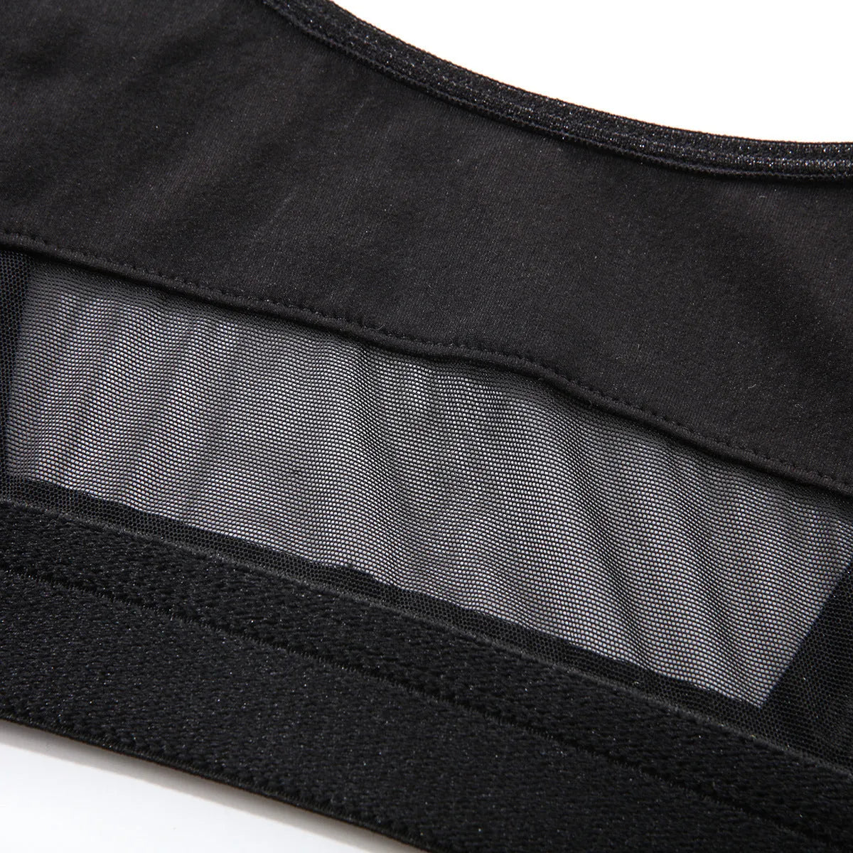 Black and white full cup bra and pants set for women on a hanger.