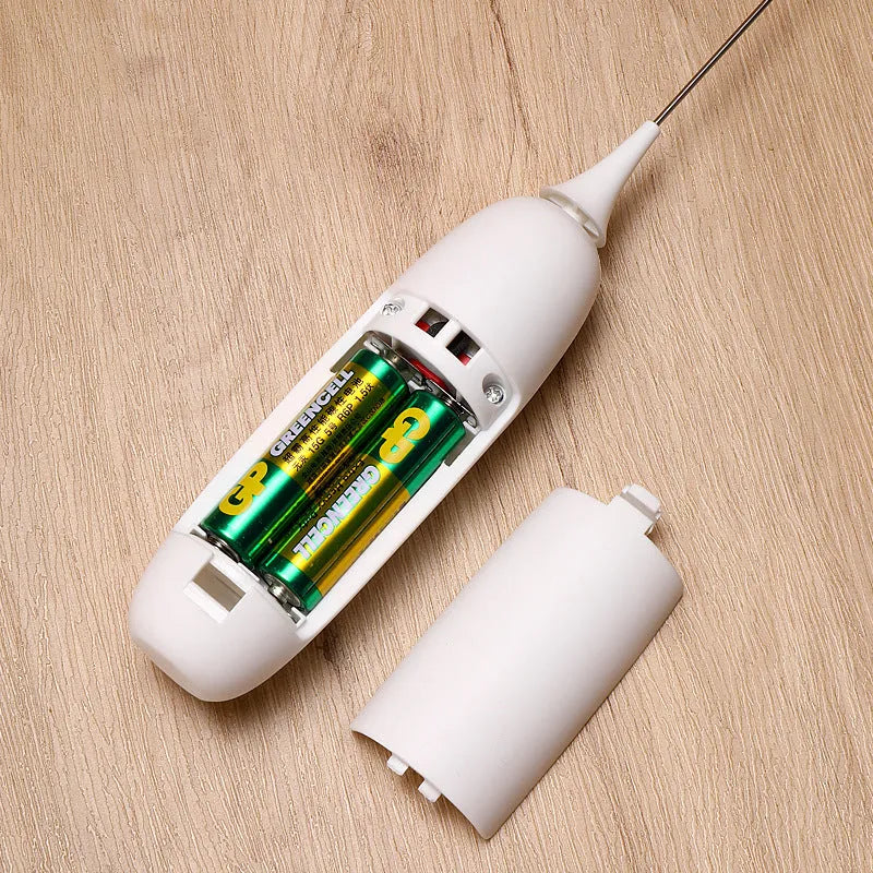 Black and white handheld electric milk frother blender for coffee preparation
