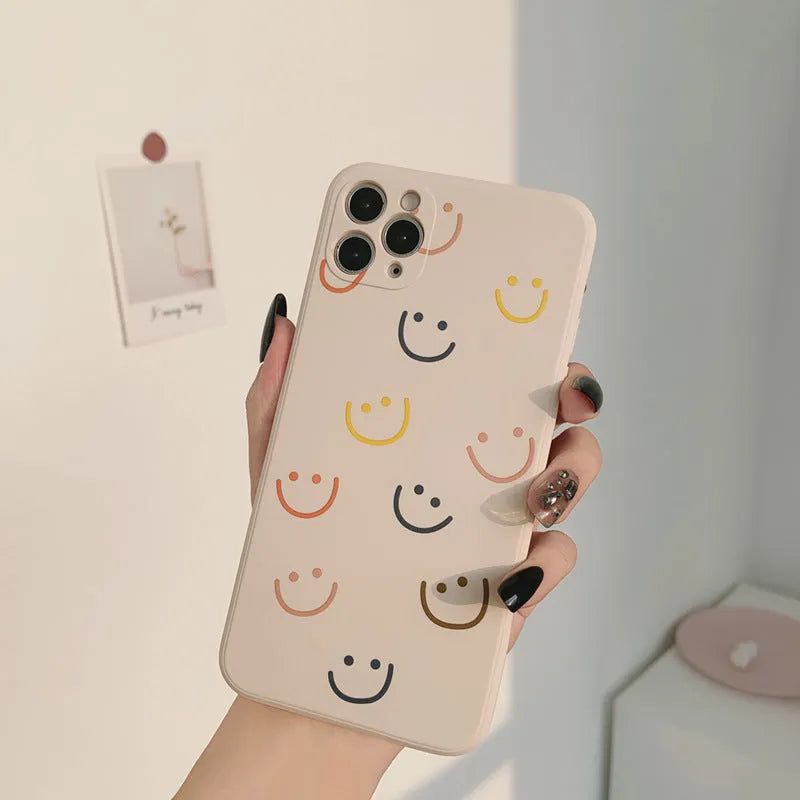 Silicone phone case with smiley design for Apple iPhone models in TPU material