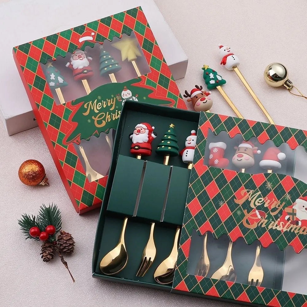 Red stainless steel Christmas spoons and forks with snowman, tree, and Santa handle designs.