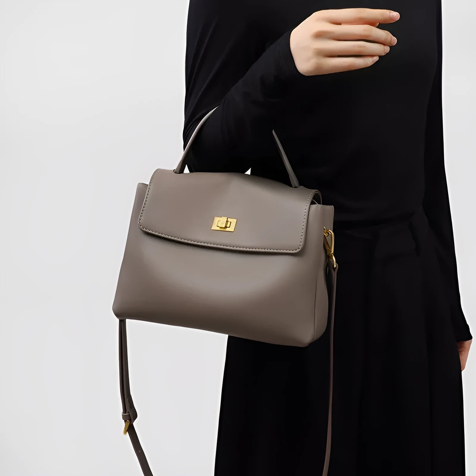 High-grade genuine leather women's postman handbag in grey viney with lock closure and sandwich pocket