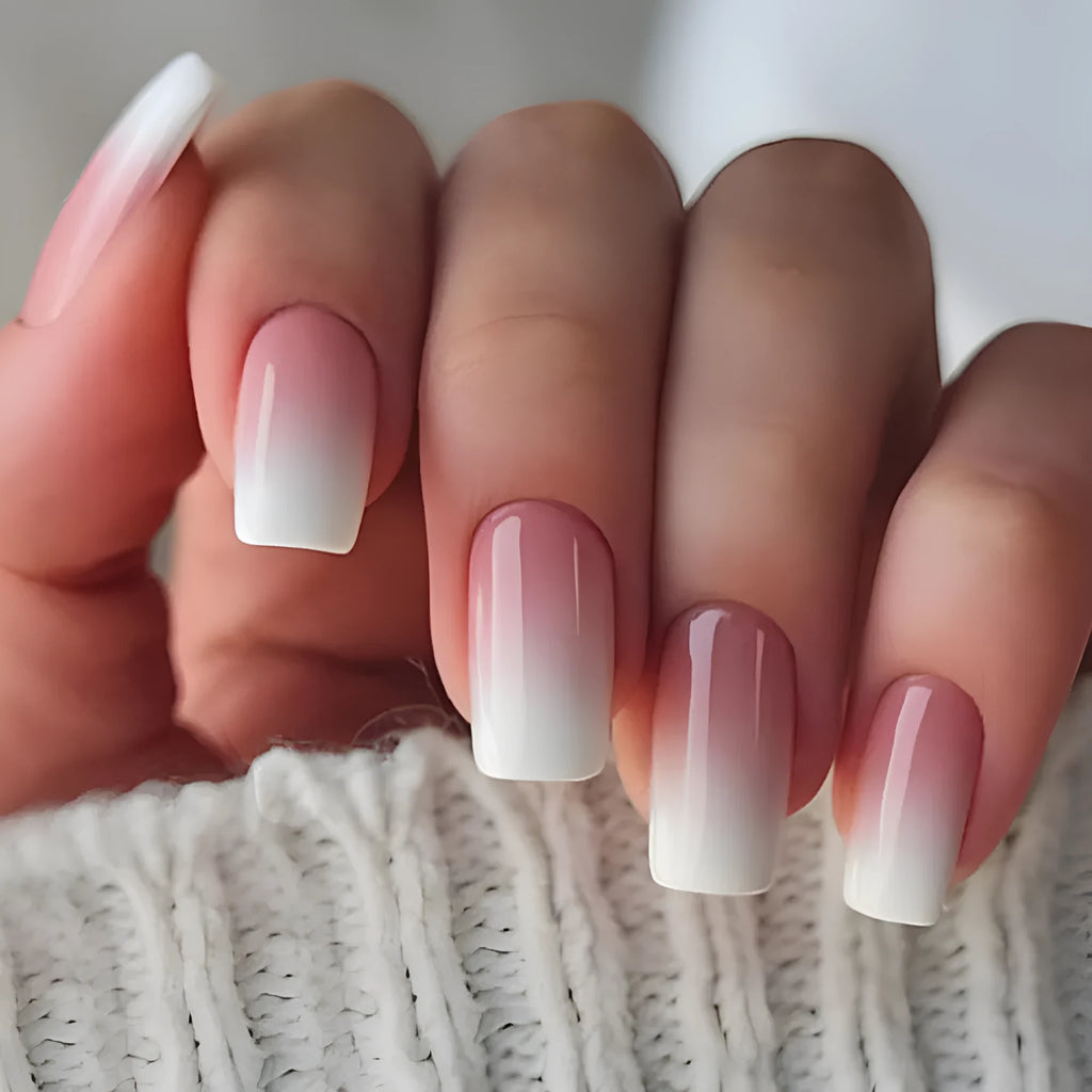 Pink and white gradient detachable nail stickers with starry sky pattern on hands showing medium European square shape