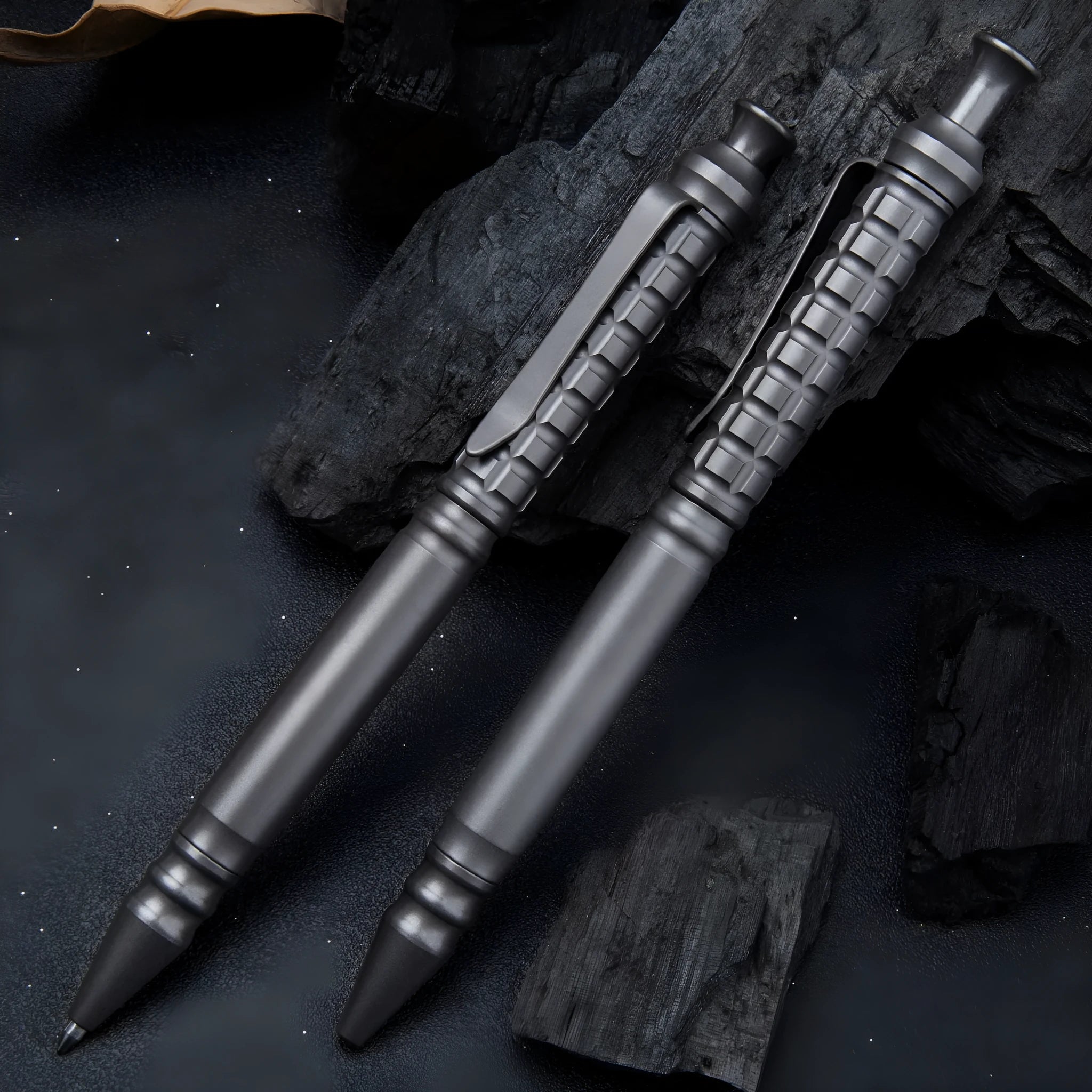 Gunmetal grey titanium tactical pen with push-action mechanism and 0.5mm nib
