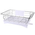Black stainless steel dish drying rack with plastic cutlery holder and drain board on a kitchen counter.