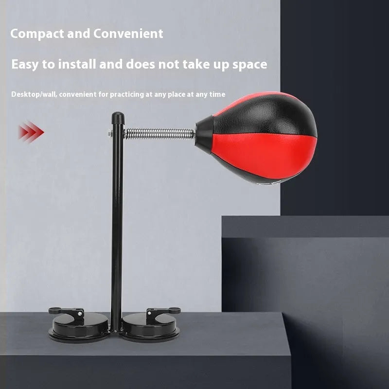 Inflatable pear-shaped red and black boxing punching ball on elastic rope with suction cup wall mount.