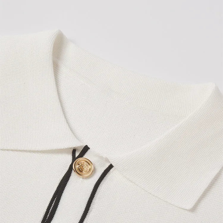White short sleeve cardigan with dark contrast lapels on a model