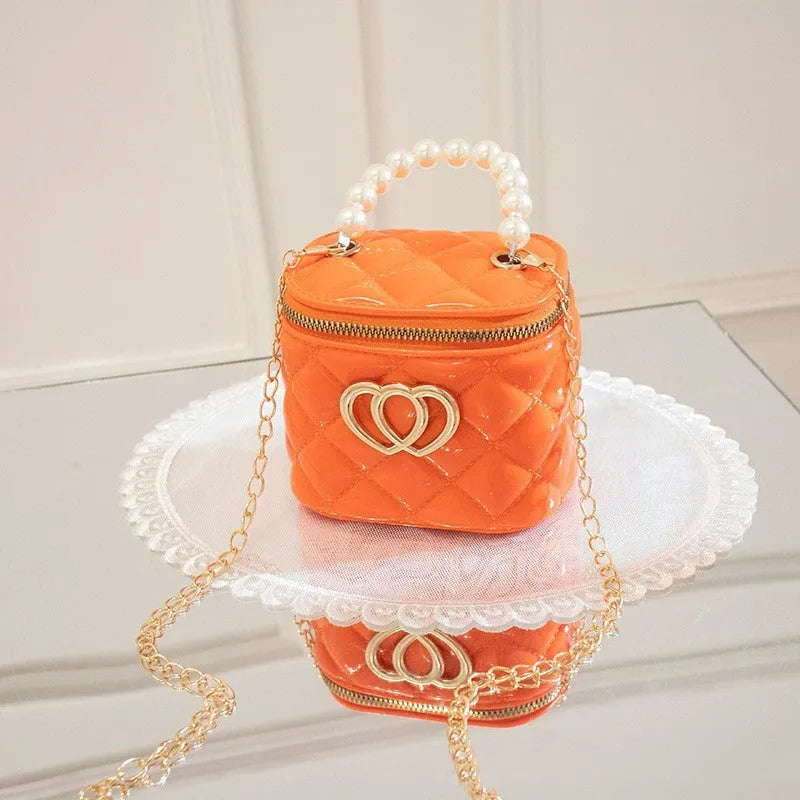 White PVC bucket gel bag with a heart-shaped pattern, shown open.