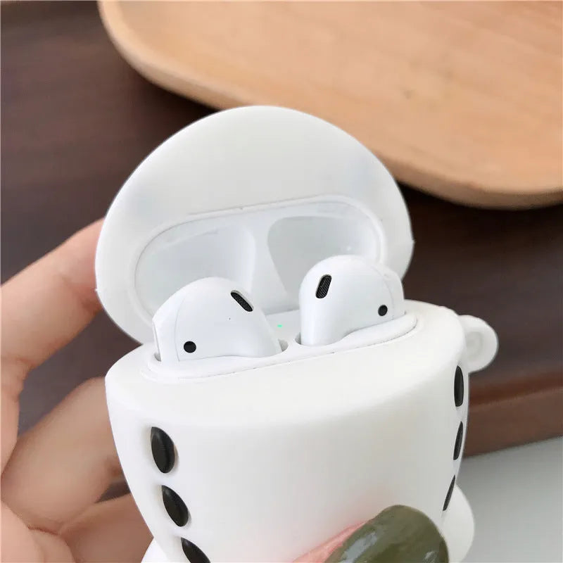 Silicone flip case with cartoon airplane design for Apple AirPods 1 and 2, includes attachment hook