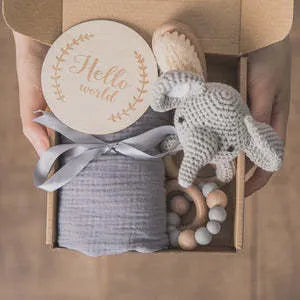 Baby teething gift set with wooden toys and large bamboo-cotton gauze blanket in assorted colours
