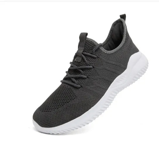 Men's black and white breathable mesh casual sneakers with lace-up closure and PVC sole.