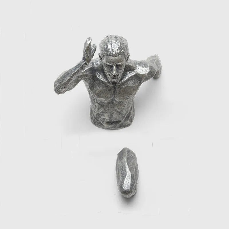 Metallic resin character sculpture wall hanging in copper, gold, or silver finish, showing left and right orientation options.