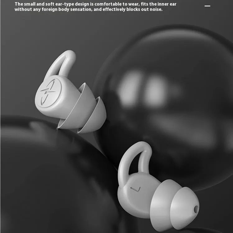 Pair of silicone noise reduction earplugs in black for sleep and sound insulation