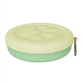 Portable outdoor dog feeding bowl shown in light pink and green colour options.