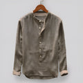 Men's solid colour cotton linen casual shirt on a hanger, showing the dark blue colour option.