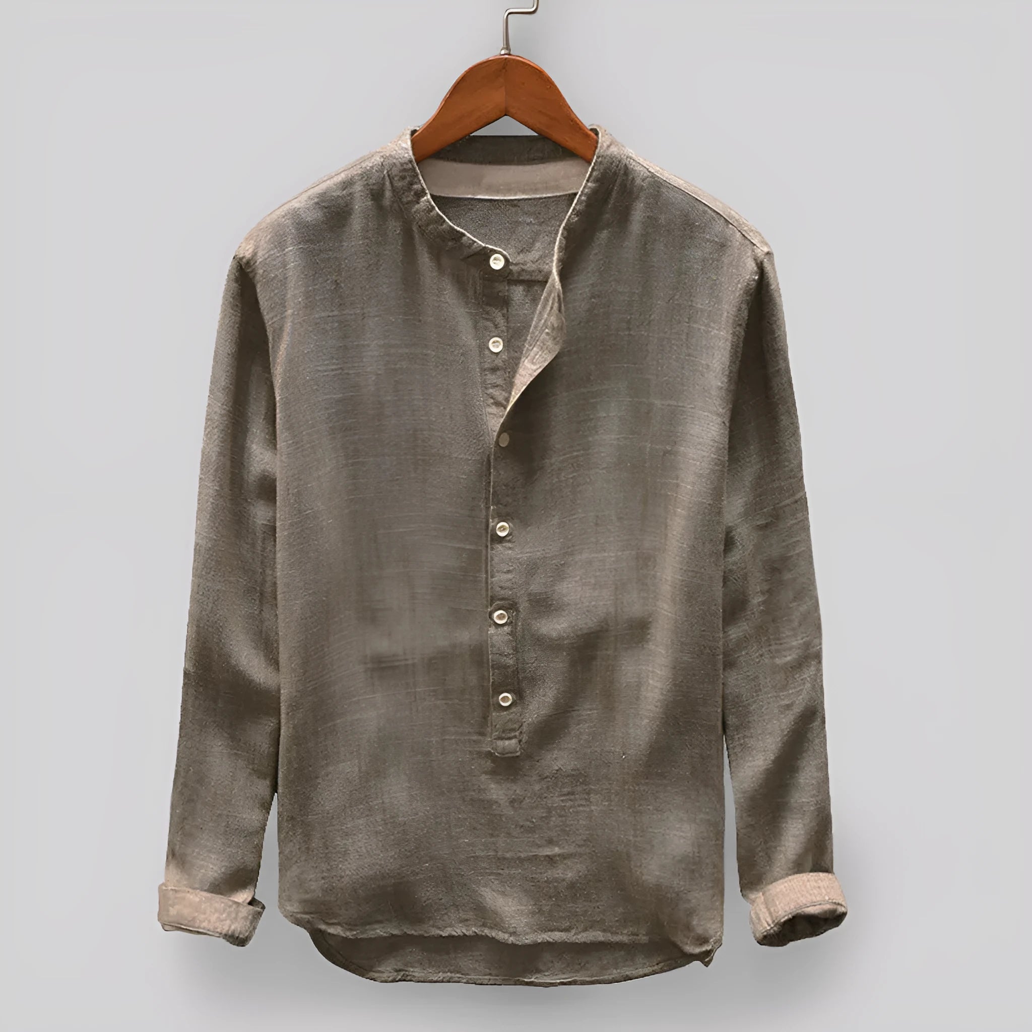 Men's solid colour cotton linen casual shirt on a hanger, showing the dark blue colour option.