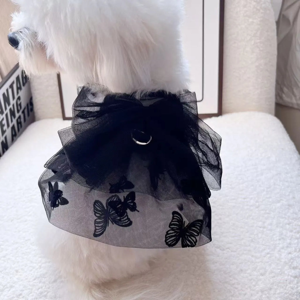 Black polyester princess tulle skirt for a small dog or cat on a white background.