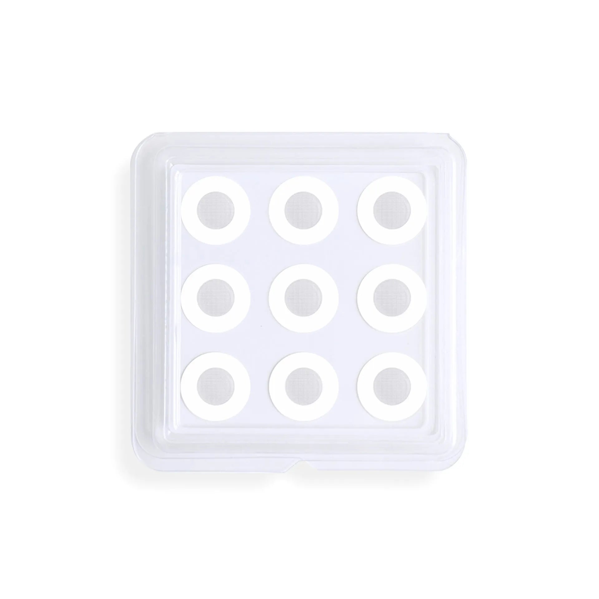Transparent hydrocolloid acne patch stickers on skin for pimple treatment.