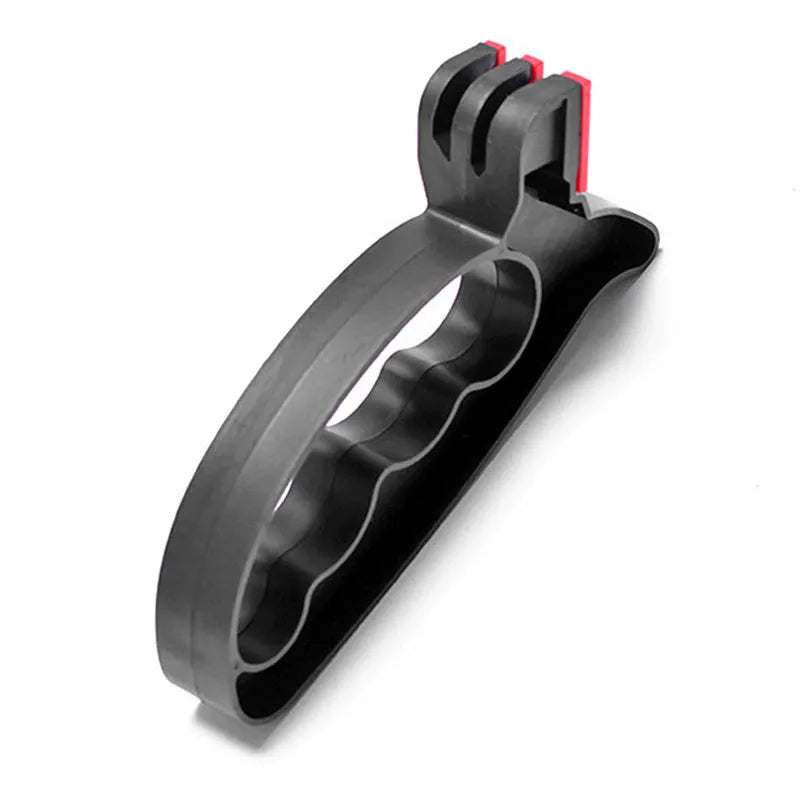 Black handheld knife and scissor sharpener showing ergonomic handle and sharpening slots on a white background.