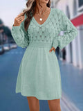 Women's long sleeve V-neck beach dress in acrylic fabric with a 3D pattern and high waist.