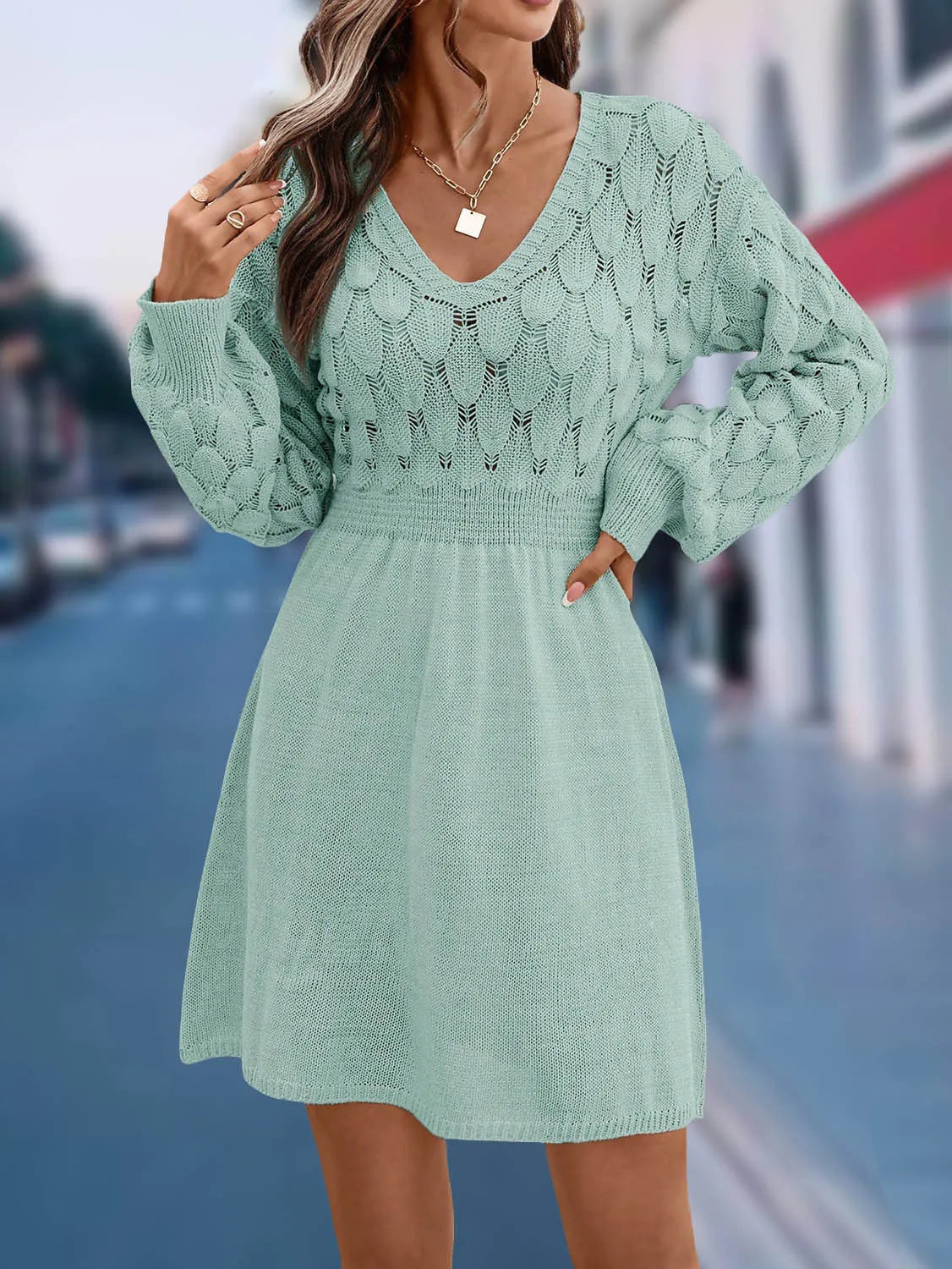 Women's long sleeve V-neck beach dress in acrylic fabric with a 3D pattern and high waist.