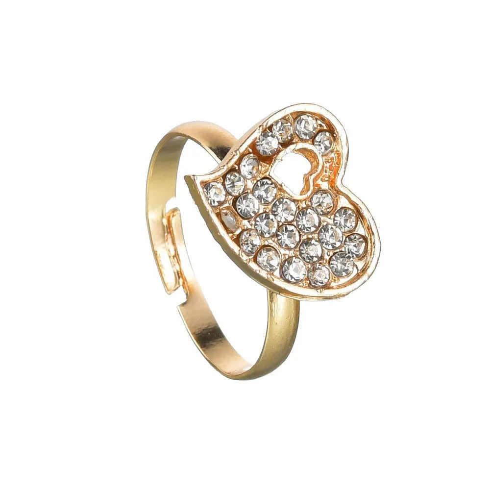 Gold tone alloy jewellery set with earrings, pendant and bracelet featuring love, water drop or bell patterns