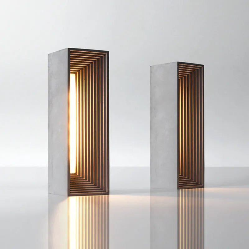 Concrete building night light table lamp in cement grey with LED illumination and Nordic style