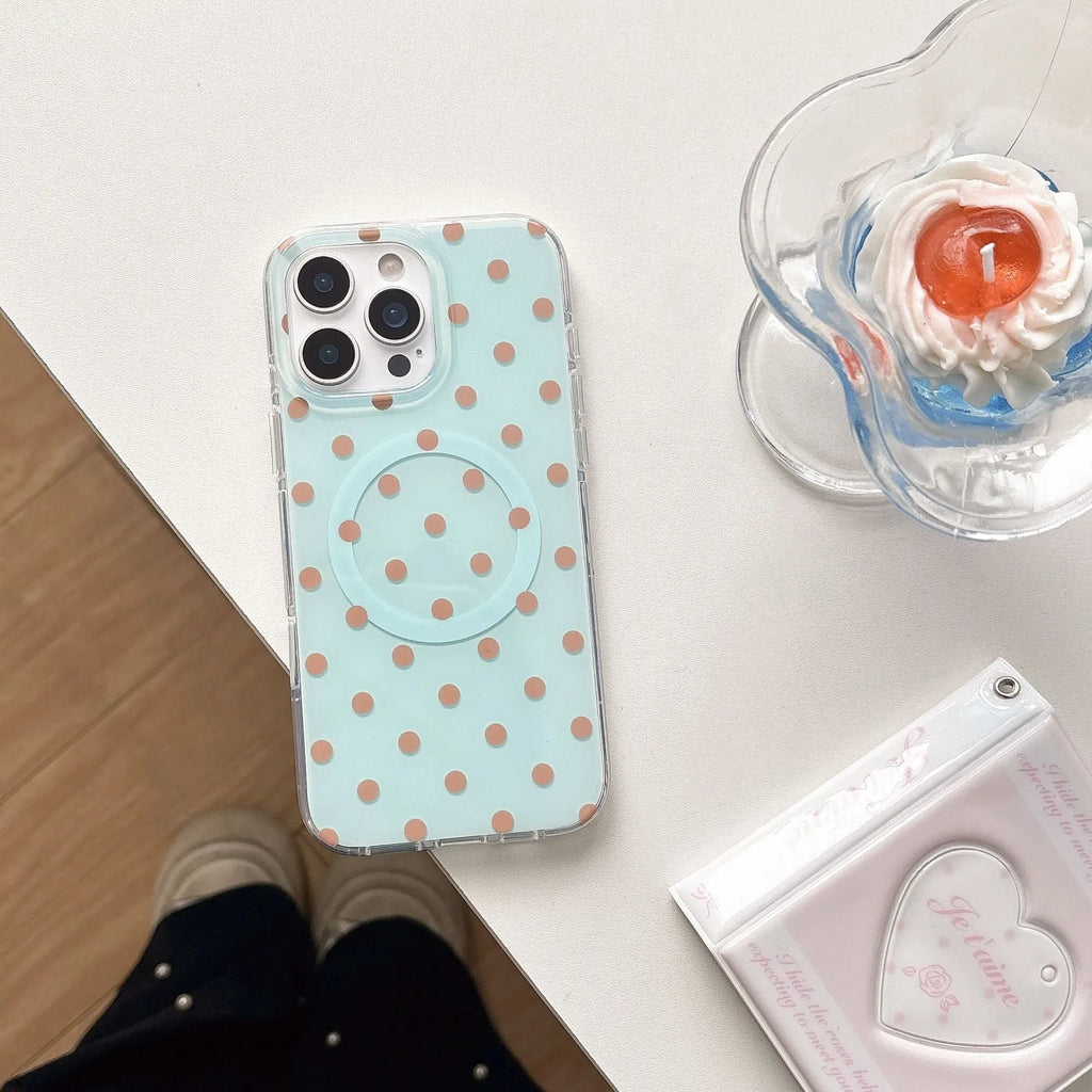 Polka dot phone case with magnetic bracket for iPhone in black showing kickstand