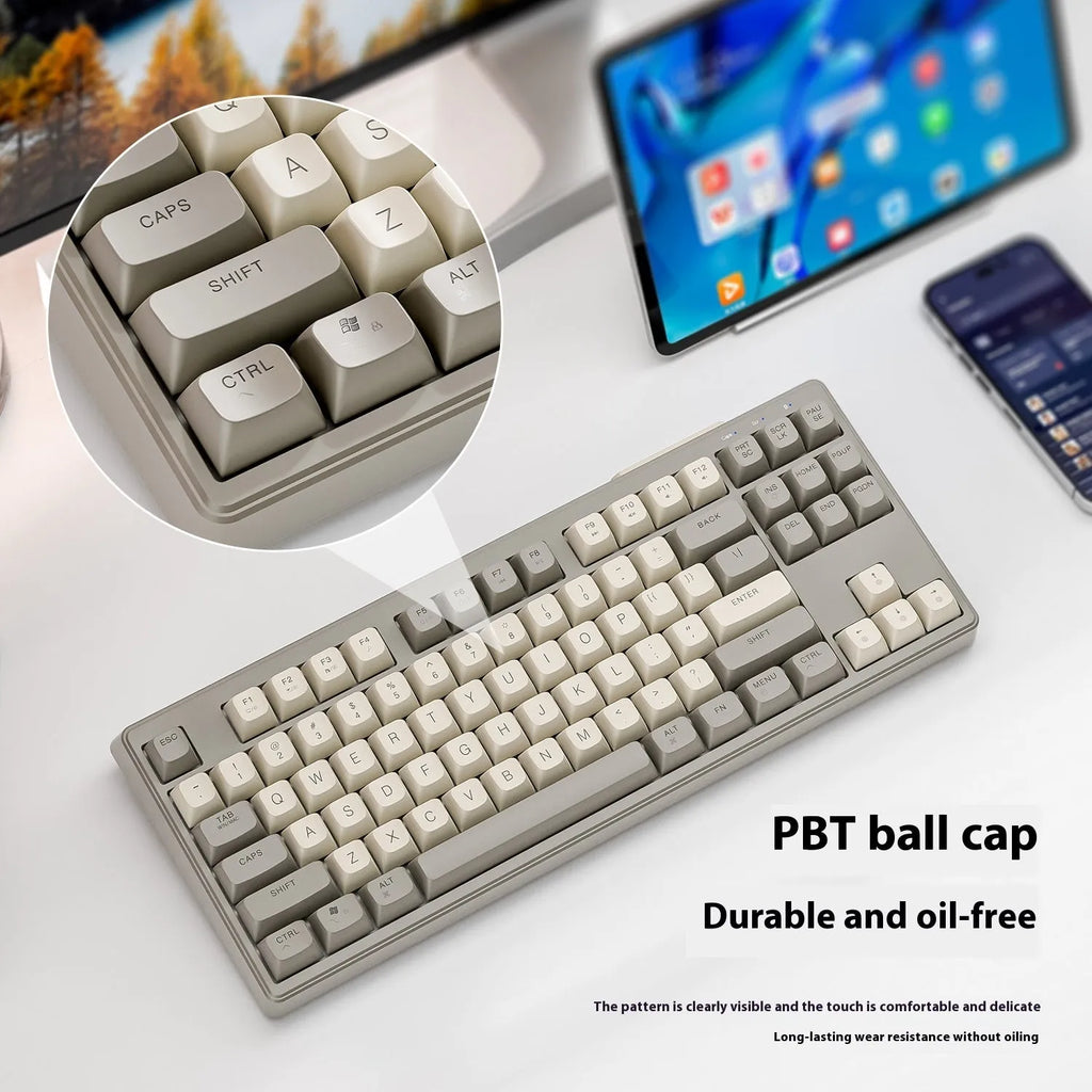 Free Wolf M87 wireless Bluetooth dual-mode mechanical feeling keyboard in blueberry colour on a desk