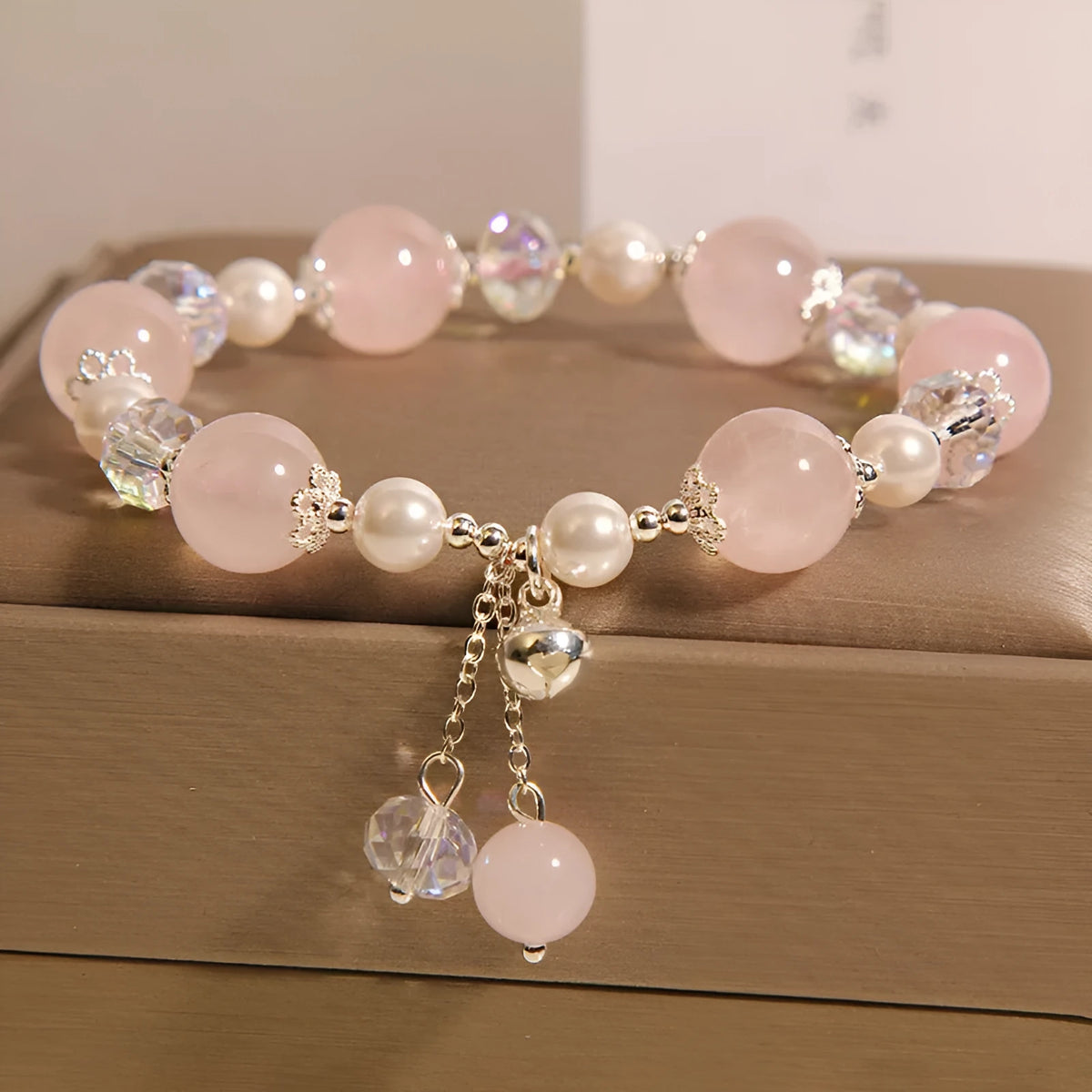 Natural pink crystal bracelet for women with pearl and bell accent, Japanese Korean style