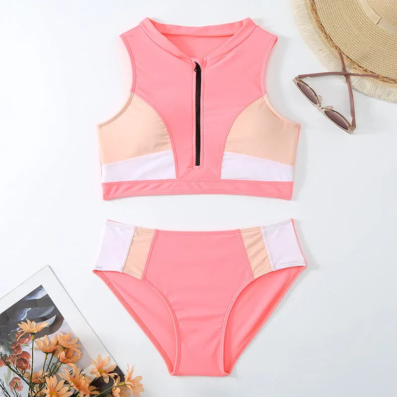 Pink high waist split leg bikini swimsuit with mesh lining on mannequin