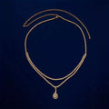 Gold or silver rhinestone waist chain with tassel detail and lobster buckle fastening