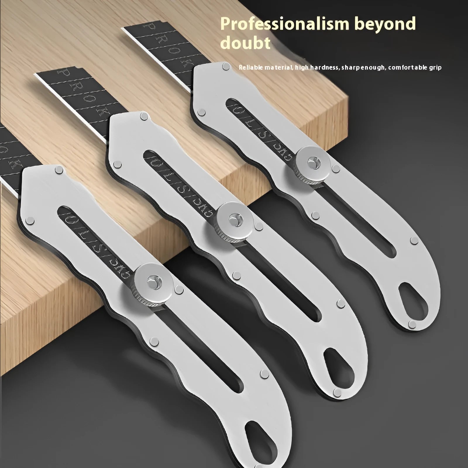 Stainless steel folding art knife with black blade and trapezoidal cutting blades