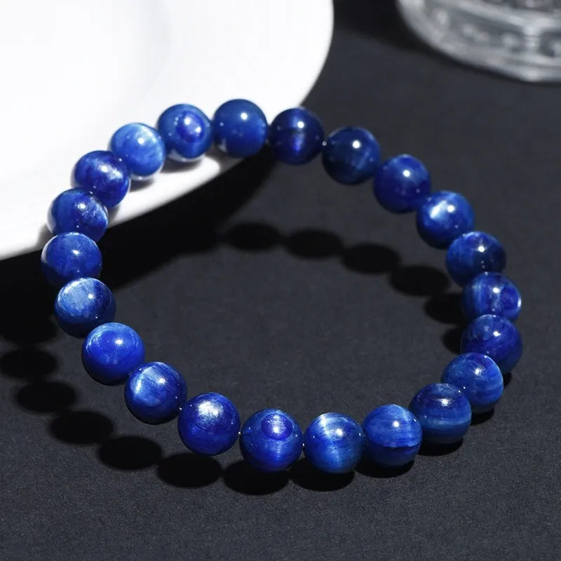 Blue crystal ball bracelet with polished 10-12mm spherical beads in single circle geometric design