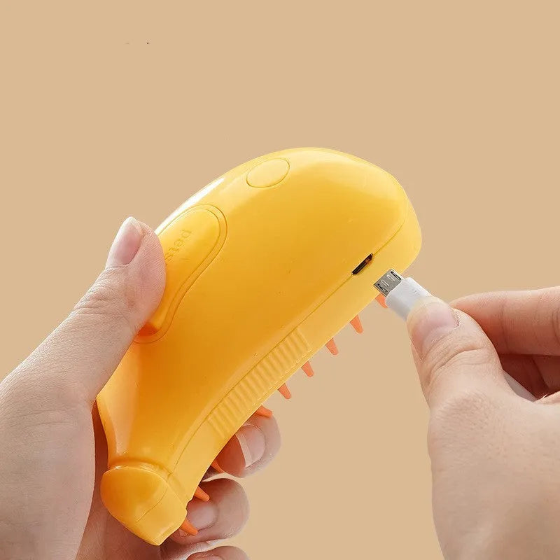 3-in-1 rechargeable pet steam brush for cats and dogs, green and yellow, with steamy spray and massage comb